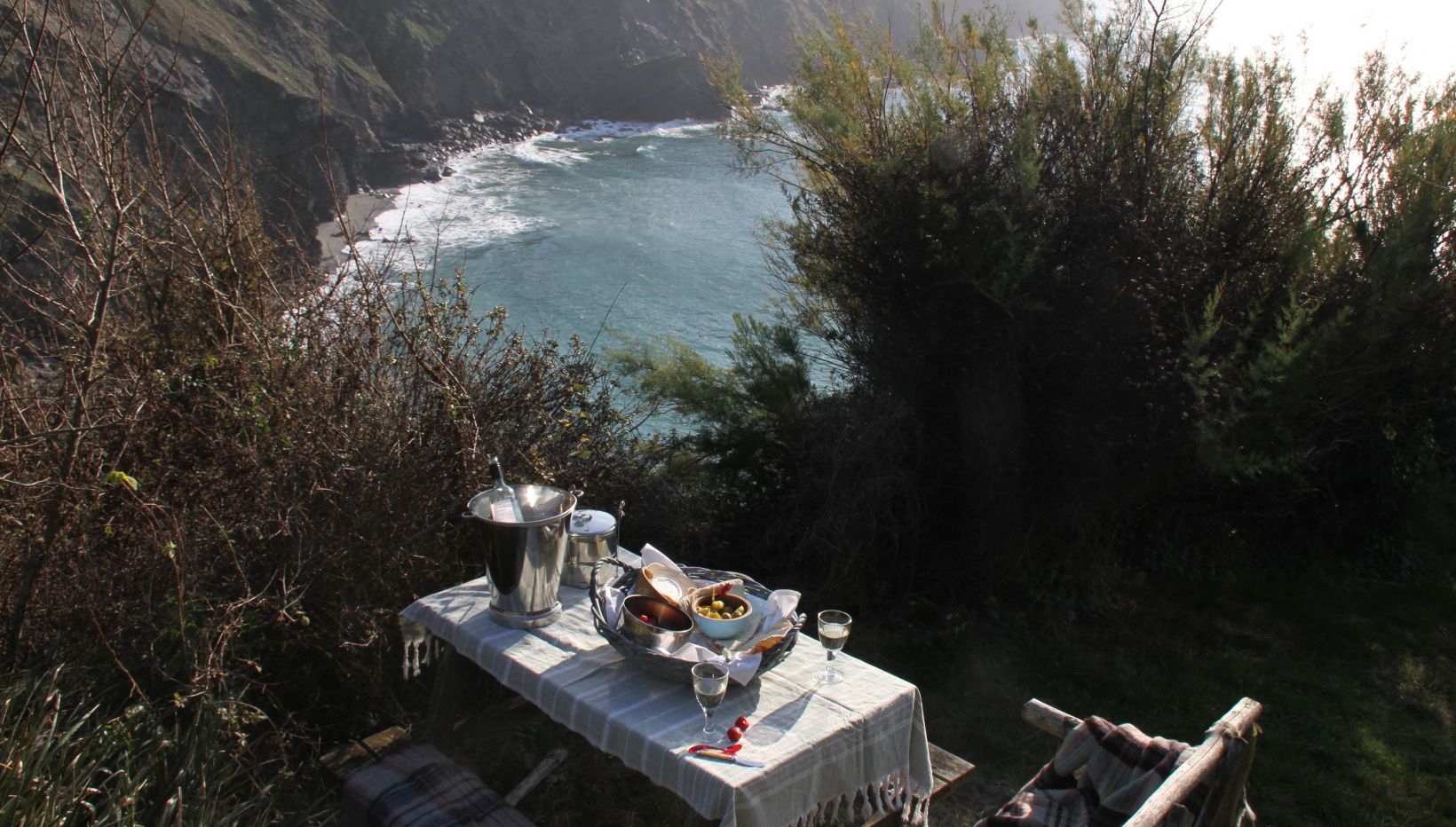 A table set up overlooking a sea view