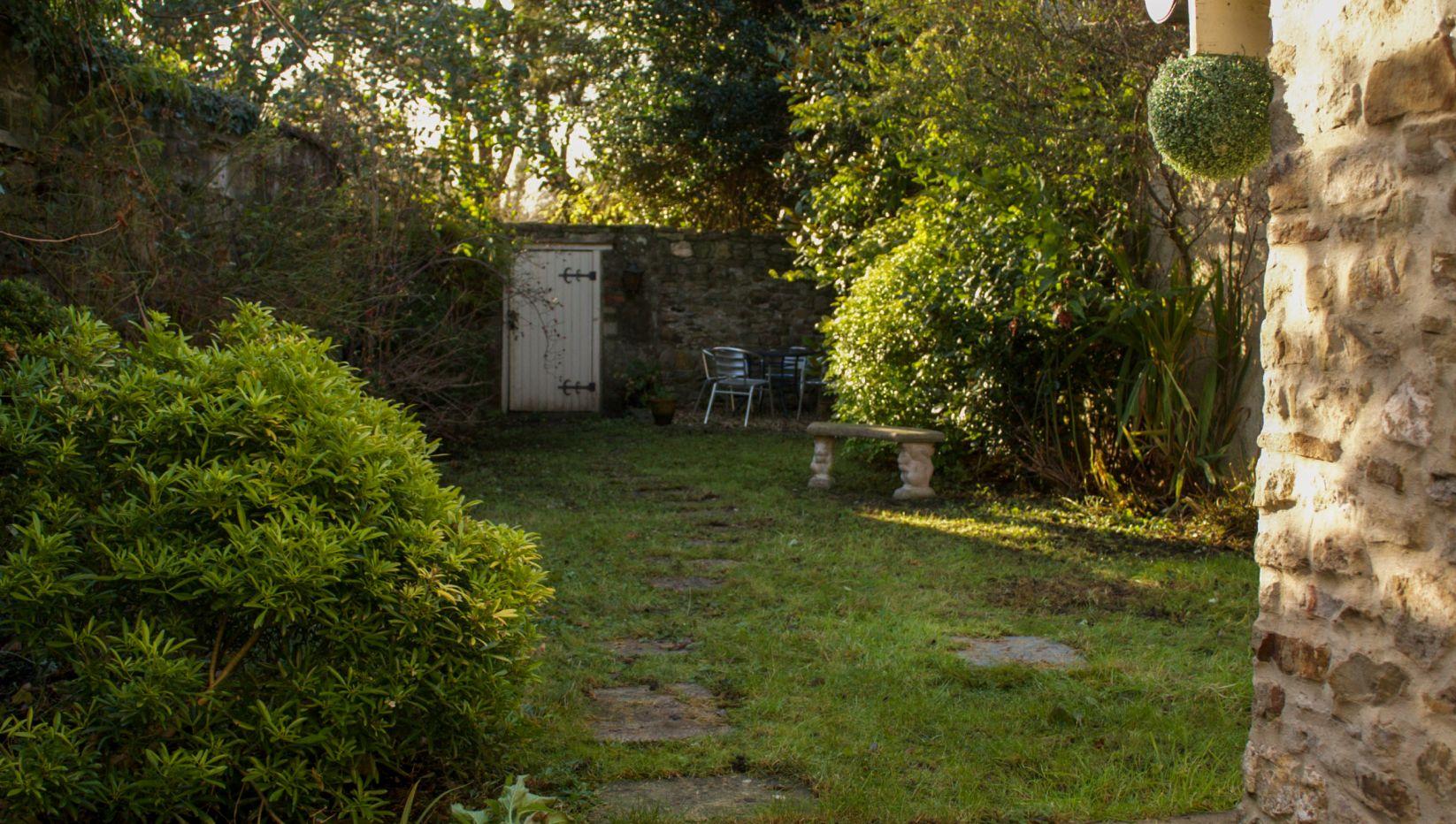 Enclosed garden at Homekot - a dog-friendly cottage