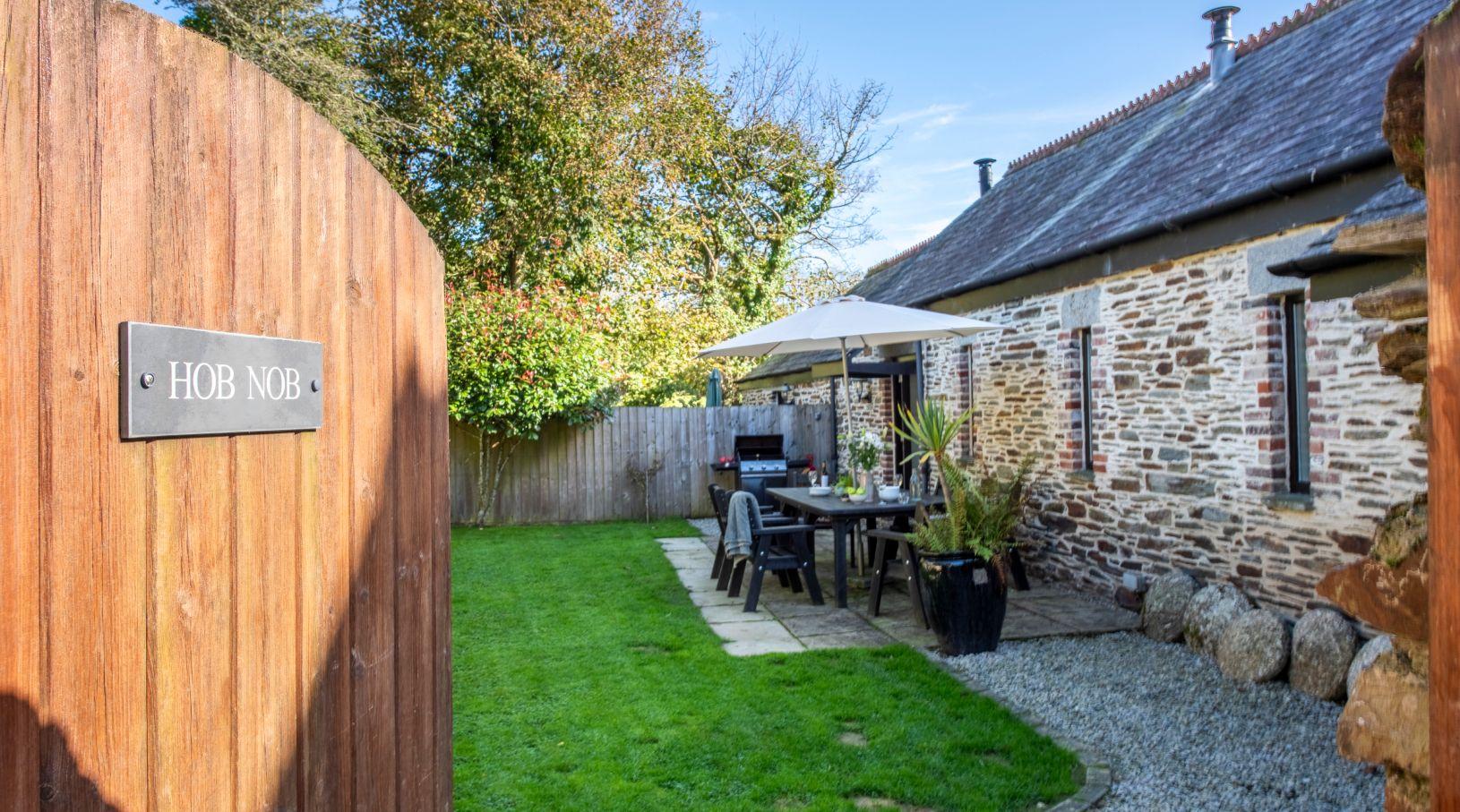 The enclosed garden with gate at Hob Nob