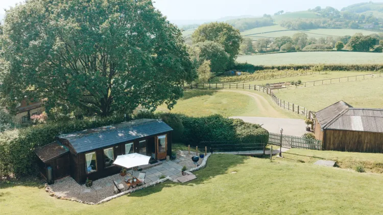 View of Swallows Cabin from above showing enclosed garden